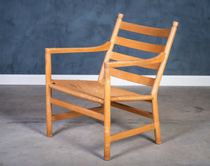 Hans J. Wegner – Model CH44 lænestol i bøg og flet, produceret af Carl Hansen & Søn, dansk design