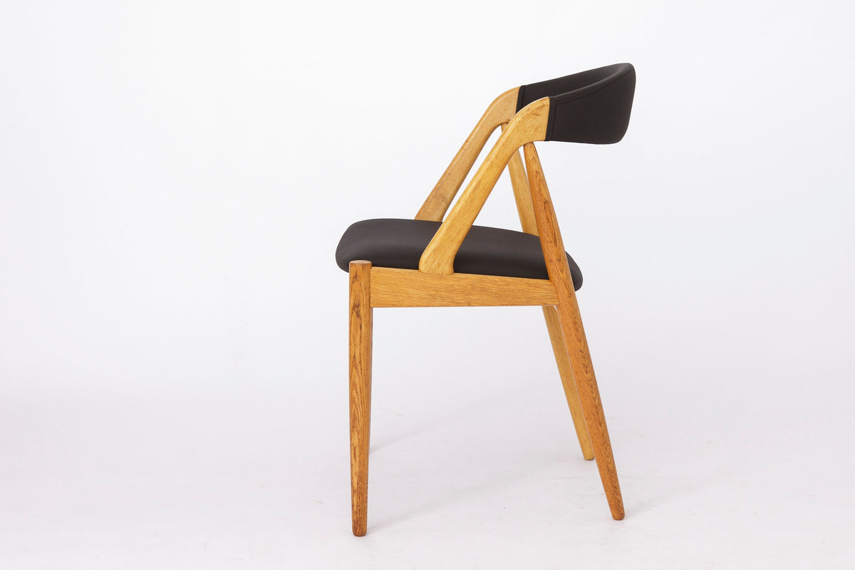 Kai Kristiansen – Model 31 stol i bøg, nybetrukket med sort skai