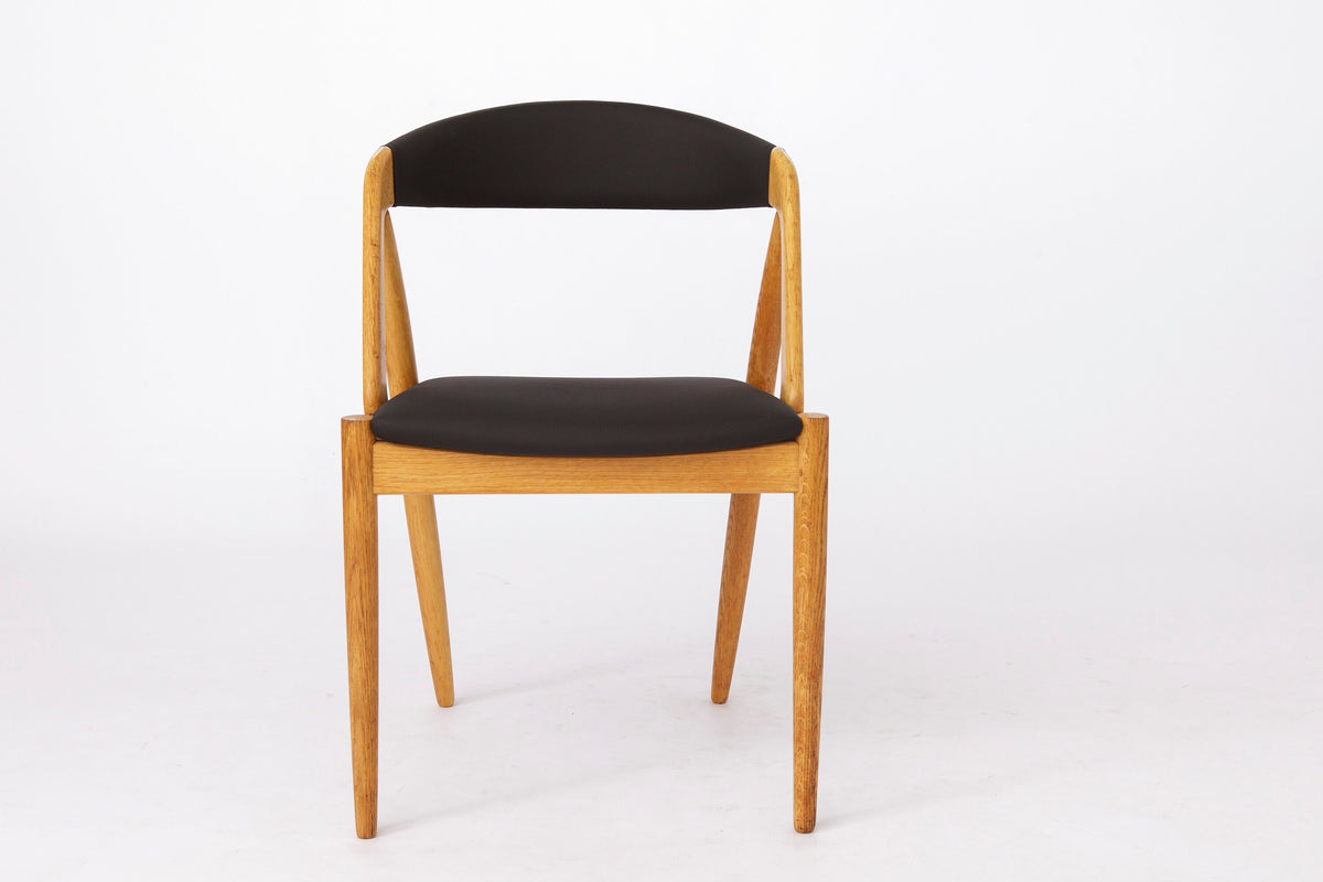 Kai Kristiansen – Model 31 stol i bøg, nybetrukket med sort skai