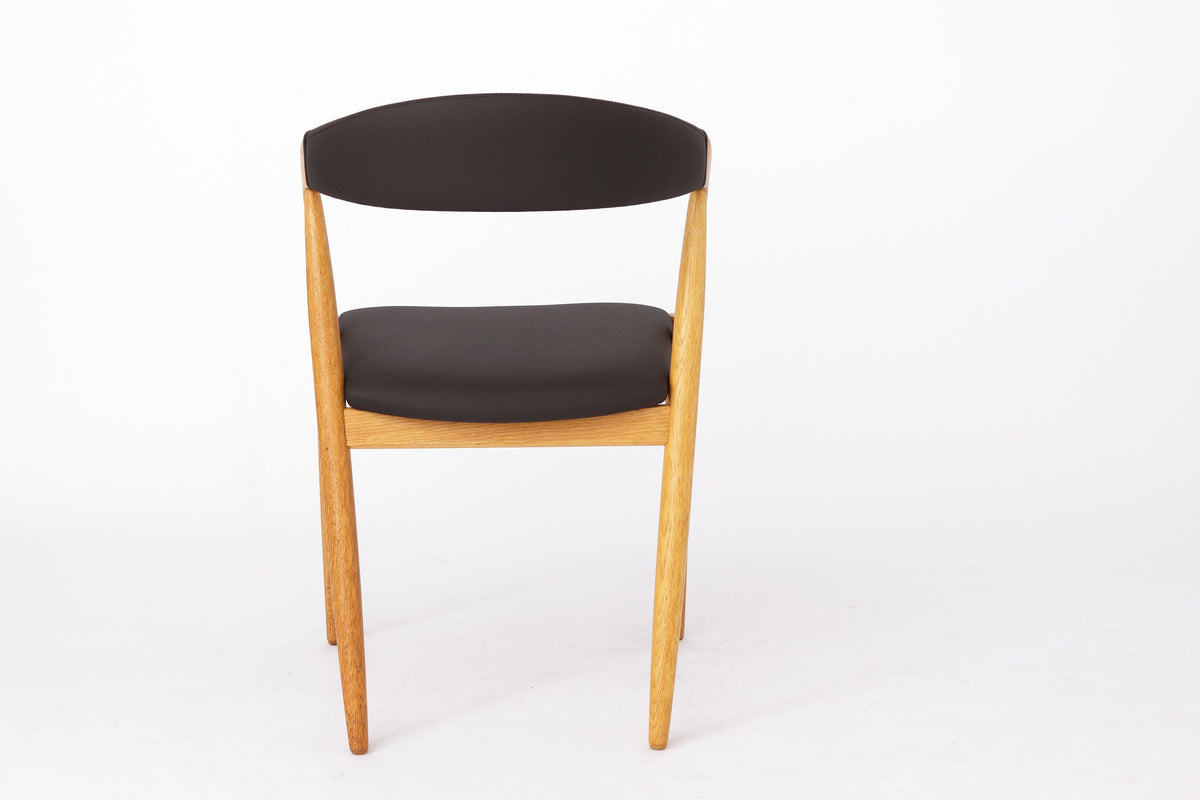 Kai Kristiansen – Model 31 stol i bøg, nybetrukket med sort skai