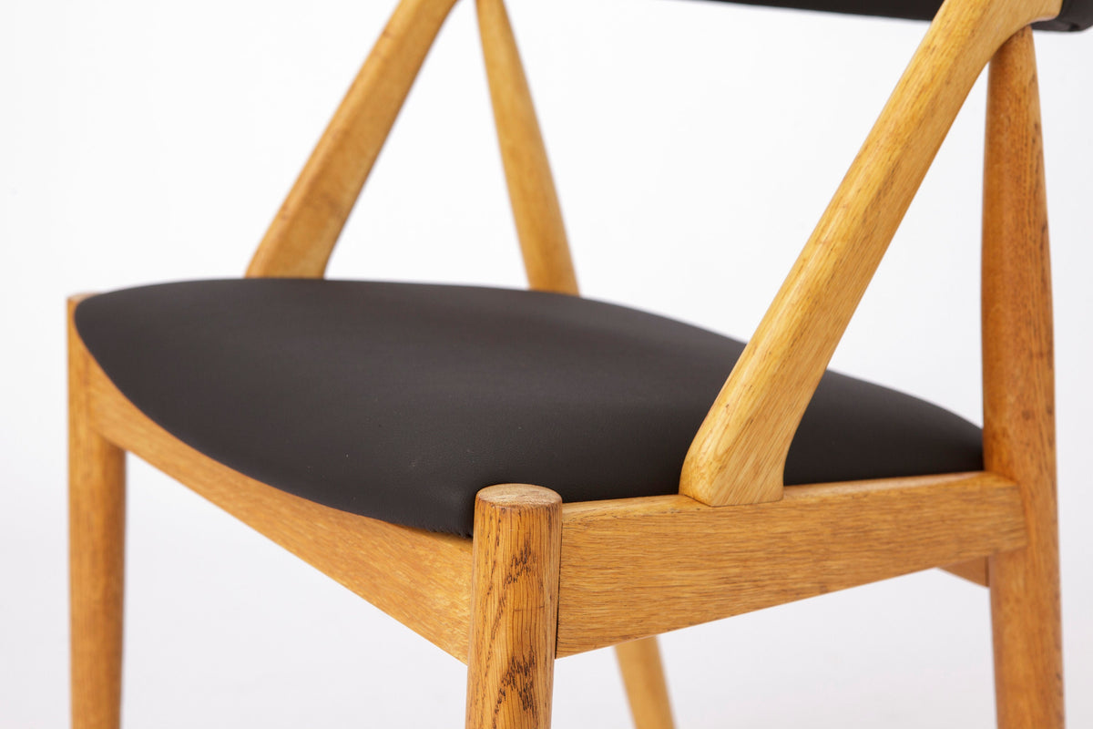 Kai Kristiansen – Model 31 stol i bøg, nybetrukket med sort skai