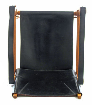 Wilhelm Kienzle – Safari lænestol i eg og sort læder, produceret af Wohnbedarf