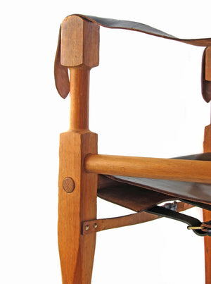 Wilhelm Kienzle – Safari lænestol i eg og sort læder, produceret af Wohnbedarf