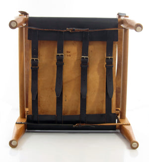 Wilhelm Kienzle – Safari lænestol i eg og sort læder, produceret af Wohnbedarf