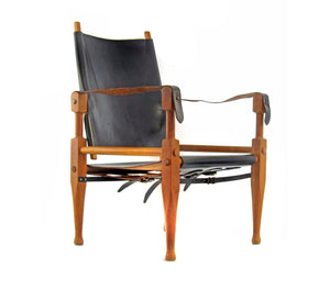 Wilhelm Kienzle – Safari lænestol i eg og sort læder, produceret af Wohnbedarf
