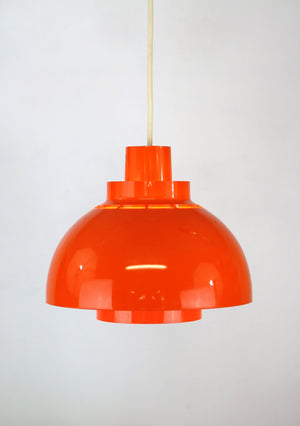 K. Kewo – Minisol pendel i orange plast for Nordisk Solar Compagni