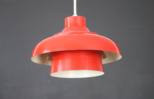 Red pendant lamp in solid Nordic design from the 1970s