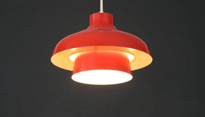 Red pendant lamp in solid Nordic design from the 1970s